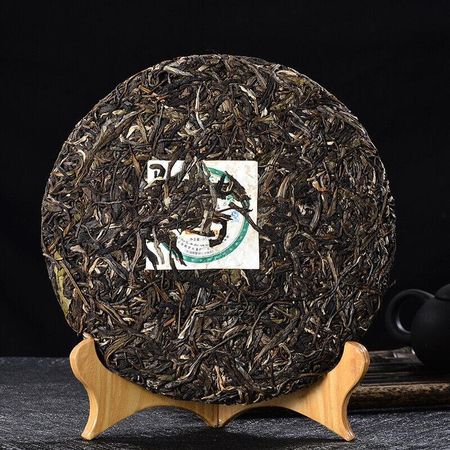 2015 Golden Peacock Arbor King * Li Ming Liming Spark Чайный торт Пуэр сырой 357г