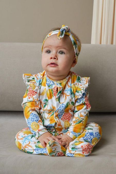 Комбинезон хлопковый на кнопках с принтом Aspaya