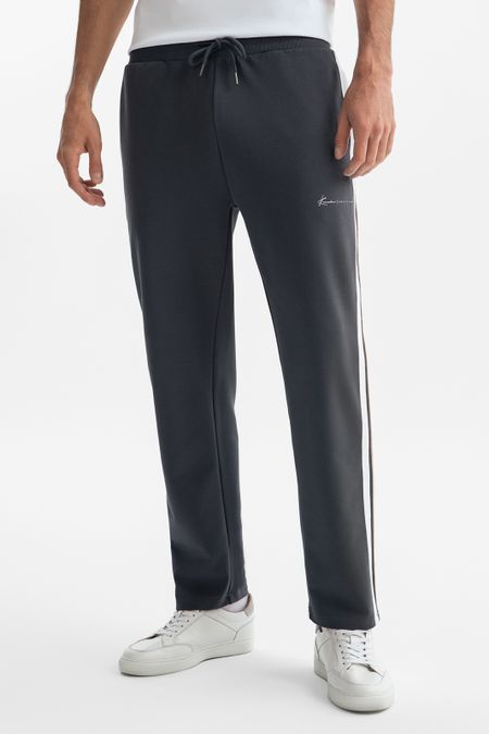 Спортивные брюки с лампасами серый цвет 7990₽