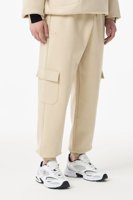 Брюки хлопковые с карманами Lacoste 19980₽