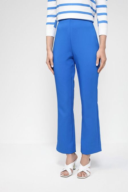 Однотонные брюки расклешенные от колена OVS 982₽