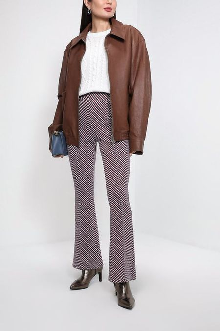 Брюки расклешенные OVS 982₽